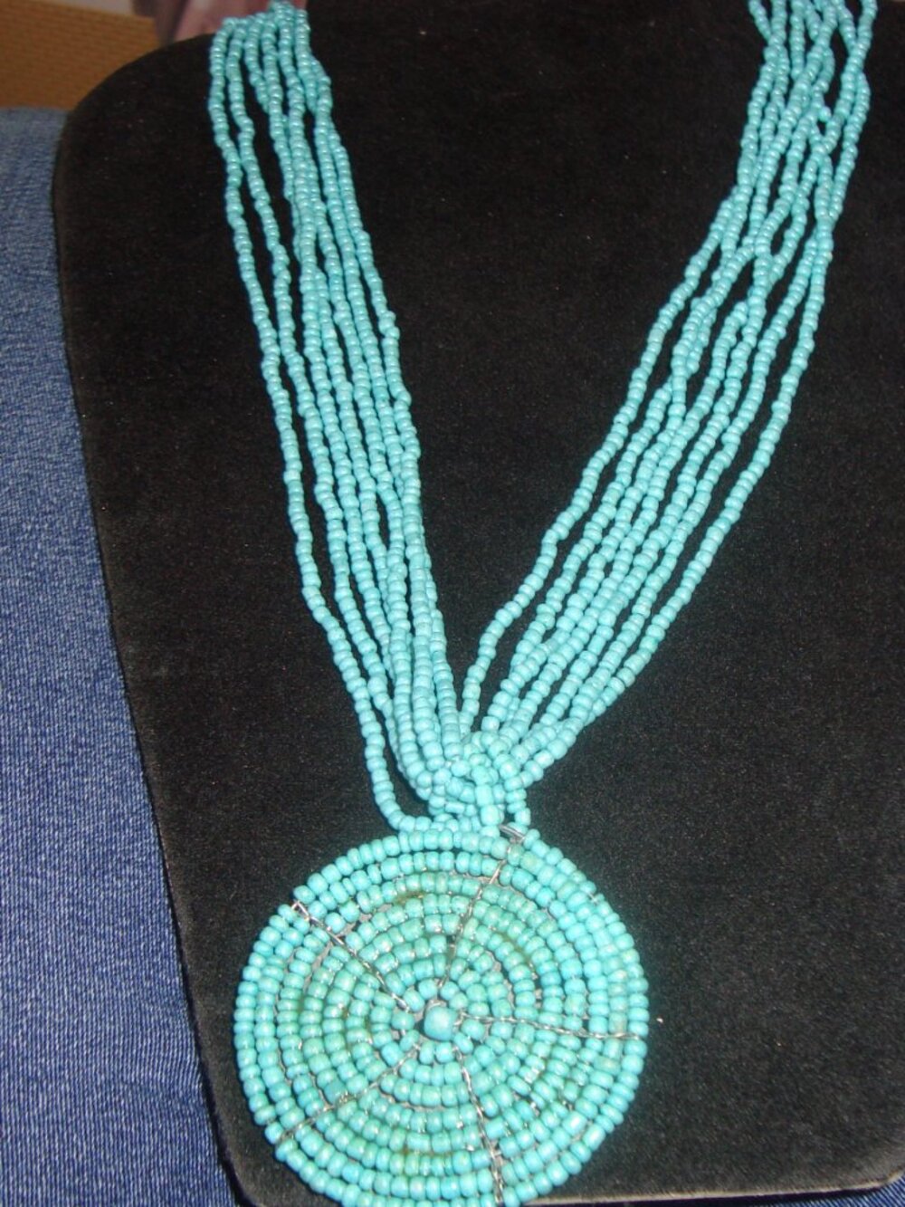 Turquoise Multi Strand Beaded Statement Necklace with Spiral Pendant